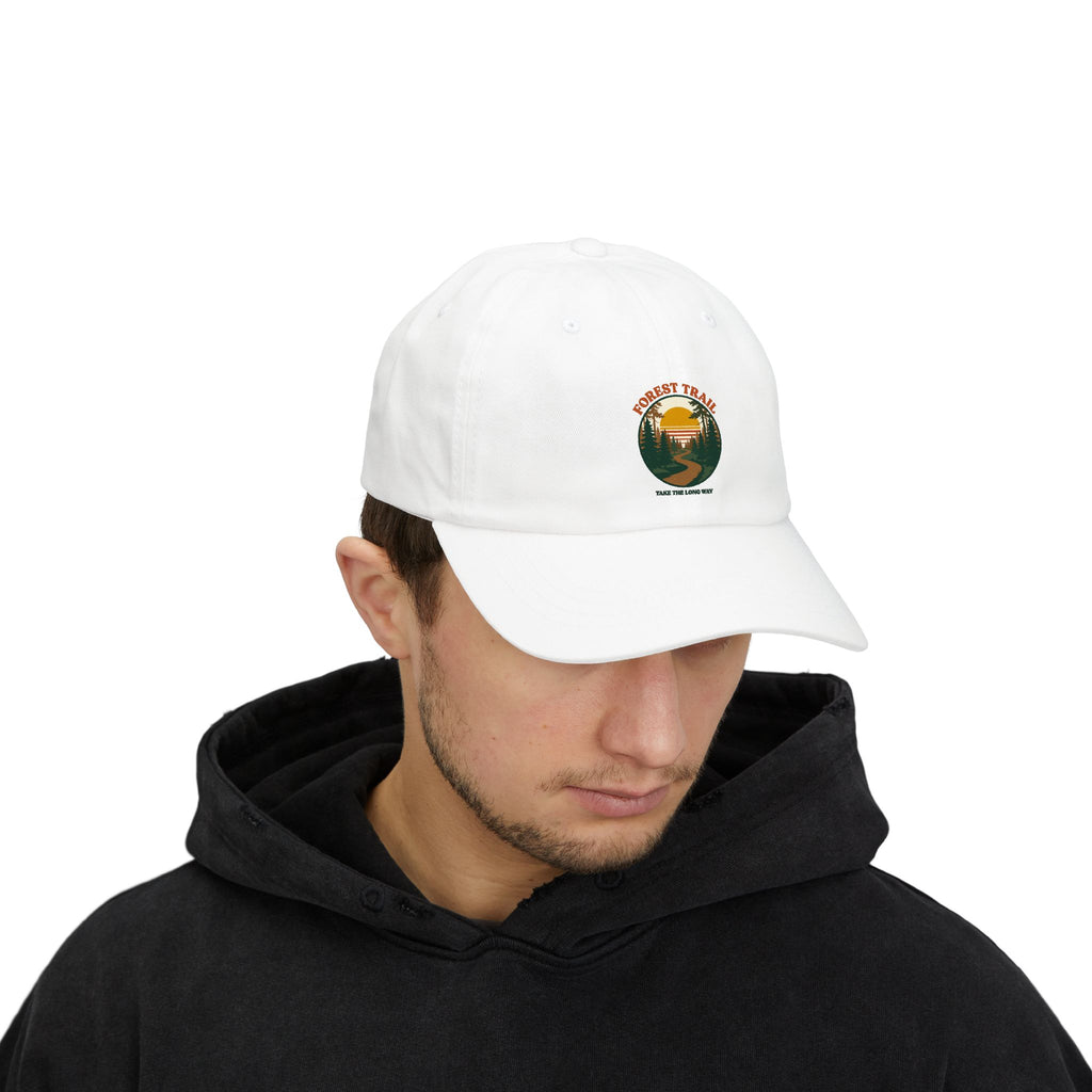 Man in a black hoodie wearing the Forest Trail dad cap in white